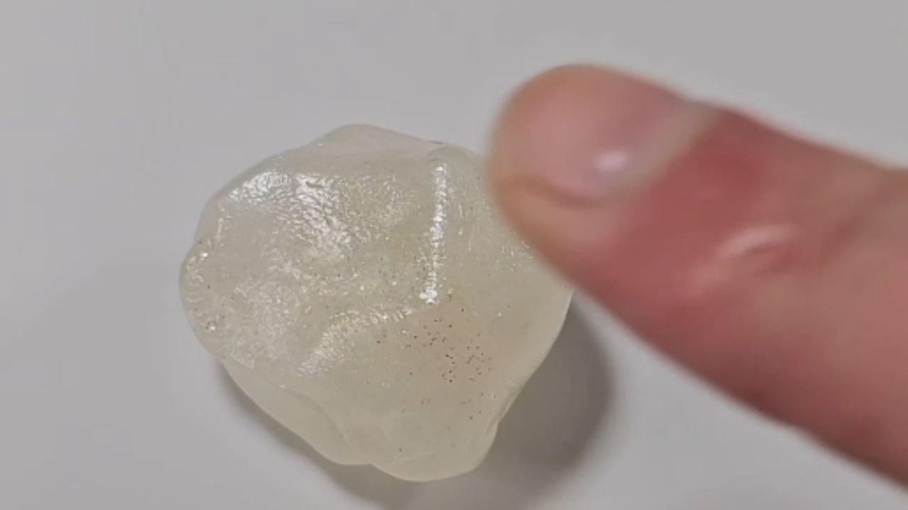 Wearable art: Resin artist transforms a fingerprint impression into a 3D keepsake pendant