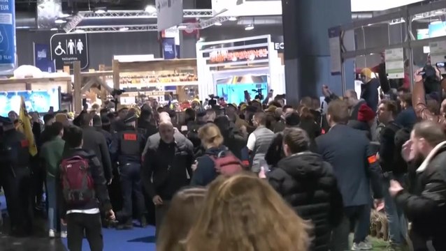 Macron booed by French farmers as he visits Paris agricultural fair