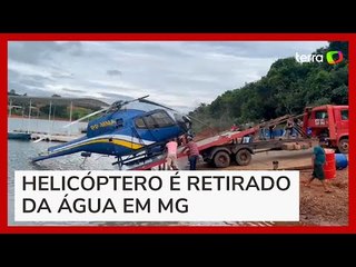 Helicóptero que caiu em Captólio (MG) é retirado da água