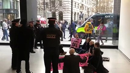 Extinction Rebellion activists occupy the Talbot building in central London