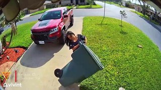 Woman Accidentally Gets Hit in The Head With Trash Can Lid | Doorbell Camera Video