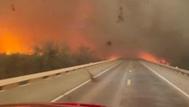 Fire engine drives through raging inferno as wildfire spreads in Texas Panhandle
