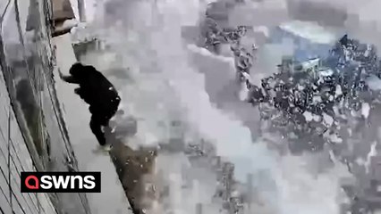 Man has lucky escape as he narrowly avoids being crushed by huge snowfall