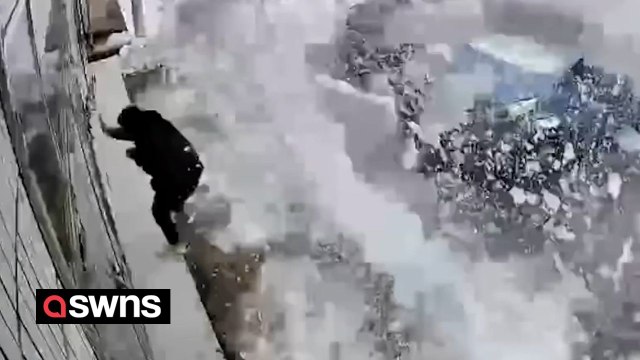 Man has lucky escape as he narrowly avoids being crushed by huge snowfall