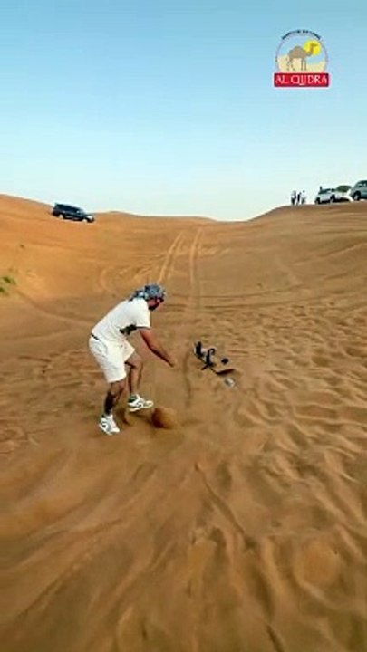 Sandboarding in Dubai Safari Desert with Al Qudra Tours #desertsafarioffers