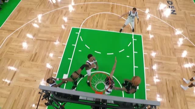 Brown wows with spin and LEFT-handed finish for Celtics