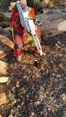 Skillfully Opening A Beer With A Chainsaw