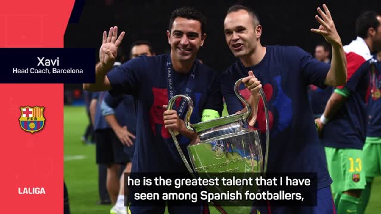 Xavi congratulates Iniesta on reaching impressi...