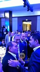 Murat Kurum, Dursun Özbek'in yanaklarını sevdi