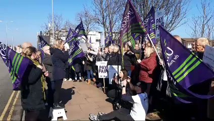 Healthcare assistants hold protest rally over being 'expected' to carryout clinical duties they're not being paid for