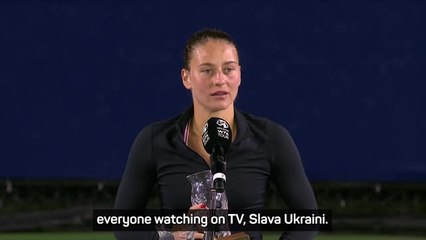 Emotional Kostyuk dedicates trophy to family in Ukraine