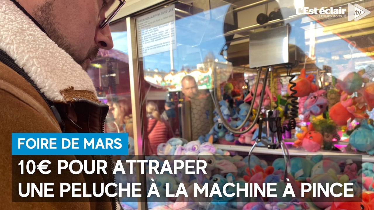 10€ pour attraper une peluche à la machine à pince à la Foire de mars