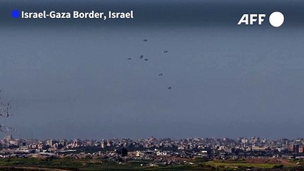 Aid airdropped on northern Gaza, seen from Israel