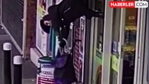 Mağaza kepengine takılan yaşlı kadın havada asılı kaldı