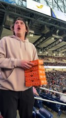 Guy Throws Free Pizza Into the Crowd At Detroit Monster Jam
