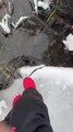 Person Walking Over Frozen Lake Falls Into Water in California, USA