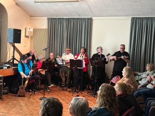 Saundersfoot ukulele band The Slipway Ukes perform pop classic 'Valerie' at Tenby’s first ever St David’s day Festival