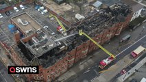 Drone footage shows Forest Gate police station's roof completely destroyed after blaze