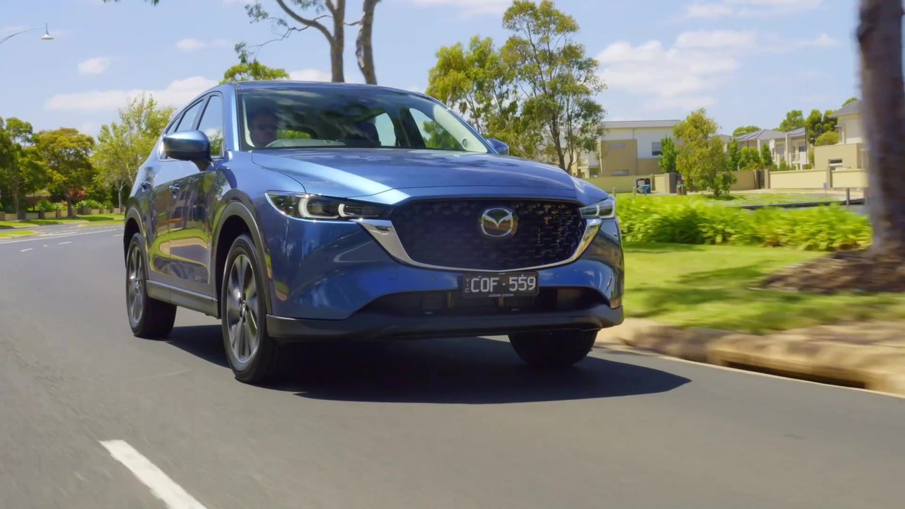 Mazda CX-5 Touring Petrol AWD in Eternal Blue Driving in the country