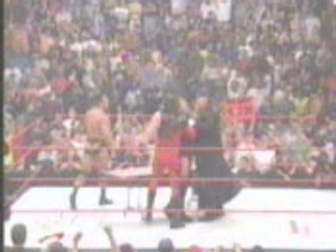 WWE - Undertaker and Kane BOTH chokeslam HHH through a table
