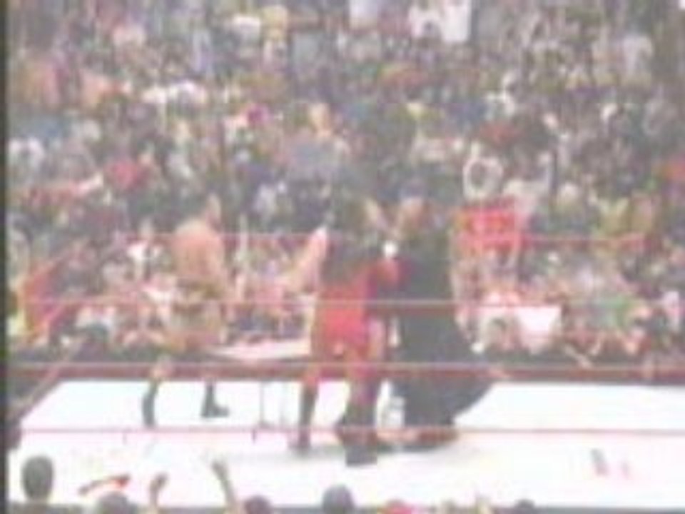 WWE - Undertaker and Kane BOTH chokeslam HHH through a table