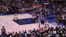 Doncic beats the shot clock with a sky-hook three pointer