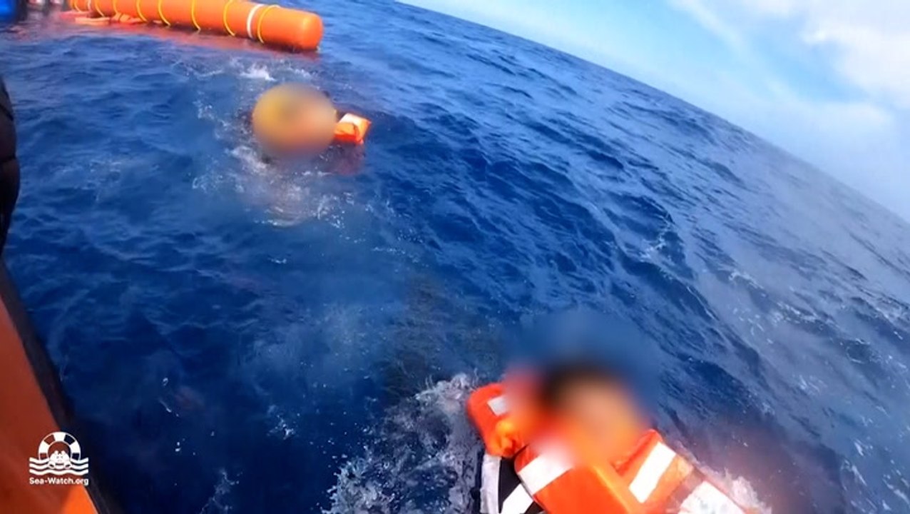 Sea-Watch NGO rescues more than 50 migrants from Mediterranean Sea after wooden boat tips