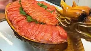 Prepare salmon dishes Asian chef style