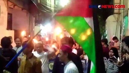 Warga Tambora Gelar Pawai Obor Sambut Ramadan