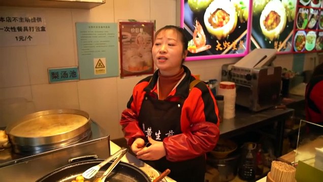 China uses key political meeting to project economic strength to the world