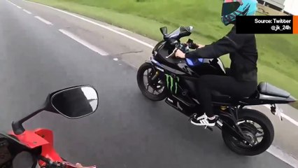 動画: 交通トラブル中、運転手がバイクライダーをハイウェイで転倒させる