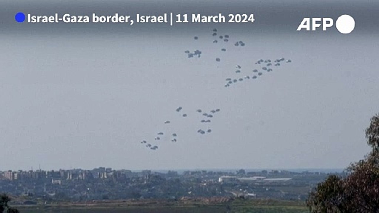 Humanitarian aid parachuted into the Gaza Strip via airdrop