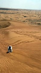 Sandboarding adventure in desert safari Dubai