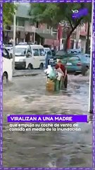 Viralizan a una madre que empuja su coche de venta de comida en medio de la inundación.