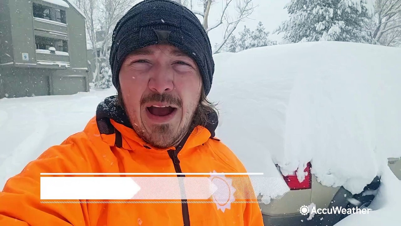 Heavy snow shuts down interstates and buries homes in Colorado