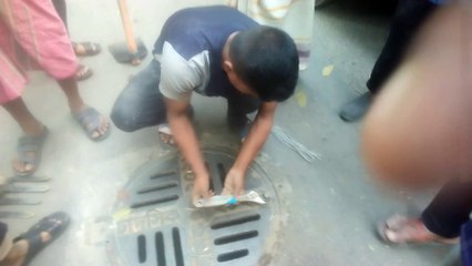 Rescuing a Dog Stuck in a Manhole
