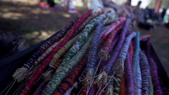 Interactive art exhibit encourages visitors to participate in traditional Aboriginal weaving techniques