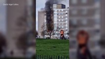 Firefighters tackle huge blaze at a block of flats