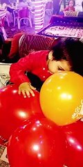 Kid Playing with Balloons