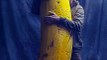 man holding a single giant banana,Midjourney prompts