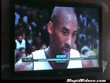 Kobe throws a towel at a lady