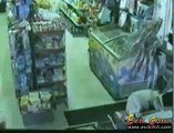 Guy Robs a Store with a Palm Tree