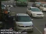 Biker on Cell Phone Crushed by Truck (wARNING)