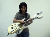 Increible toca la cancion de Mario Bros con dos guitarras