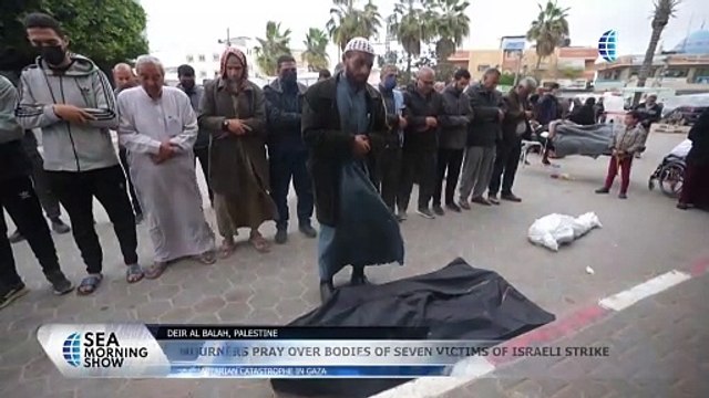 Mourners Pray Over Bodies Of Seven Victims Of Israeli Strike