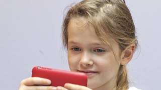 Staring at mobile phones is putting children at risk of blindness