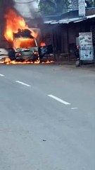 खड़ी कार में लगी आग, देखें वीडियो