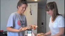 Two Girls Slapping Each Other With Pizza