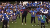 Mrs Obama helps break world record for jumping jacks