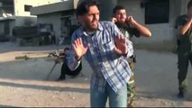 Dramatico video muestra los rebeldes atacando a las fuerzas del gobierno sirio en Homs